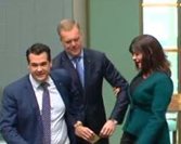 Tony Smith is dragged to the Speaker’s chair by colleagues Michael Sukkar and Lucy Wicks